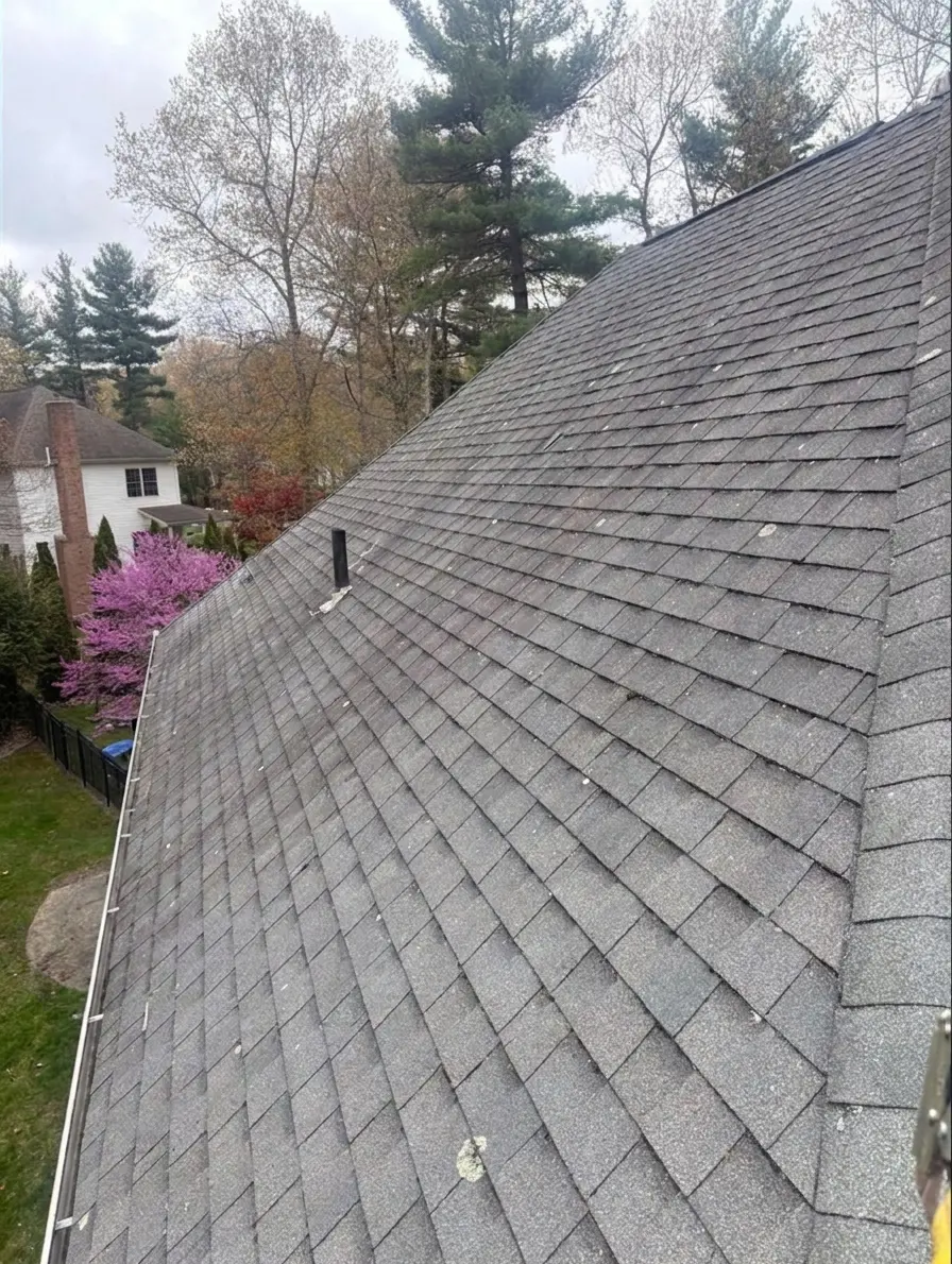 Roof replacement in progress on a Connecticut house